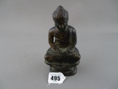 Antique Oriental bronze figure of Buddha in meditation pose upon a lotus leaf base