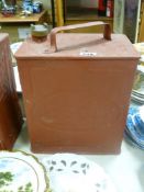 Red coloured vintage Esso petrol can