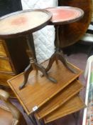 Pair of leather tooled top wine tables and a bamboo and metal framed nest of three tables