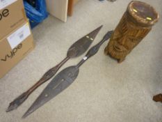 Pair of African paddle spears and a carved African drum