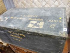 Black travel trunk with metal edging and inscribed 'A Wright'