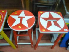 Pair of wooden stools, one circular, one square with painted Star and Texaco emblems