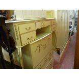 Cream Continental bedroom suite of twin wardrobes, chest of drawers, dressing table etc