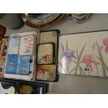 Quantity of boxed placemats and coasters