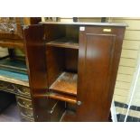 Dark wood cupboard with multi-shelf interior