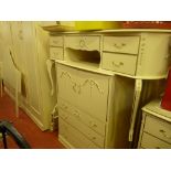 Cream French/Continental bedroom suite of twin wardrobes, dressing table and chest of drawers