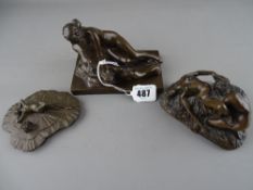 Bronze effect figurine and two others depicting naked persons in various poses