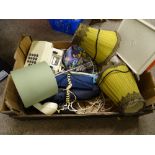 Box of household items including table lamps, vintage telephones etc