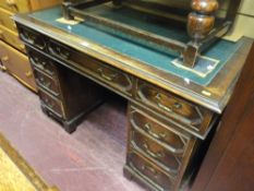 Twin pedestal leather effect tooled top writing desk