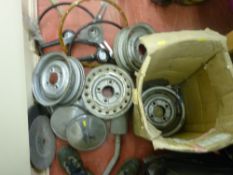 Set of four possibly Mini steel rim hubcaps and steering wheels etc