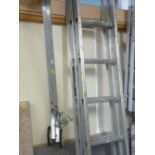 Two section aluminium ladder with creeper attachment