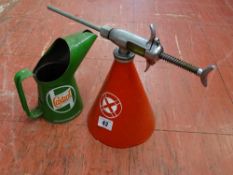 Small metal red conical pressure sprayer and a green metal pint measure with Castrol Motor Oil