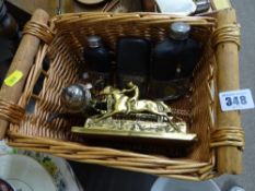 Wicker basket containing electroplate, brass letter rack, hip flasks etc