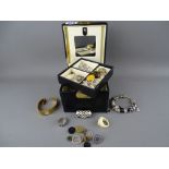 Modern jewellery box and contents including nine carat gold and other rings, a lady's bracelet watch