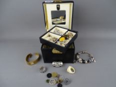 Modern jewellery box and contents including nine carat gold and other rings, a lady's bracelet watch