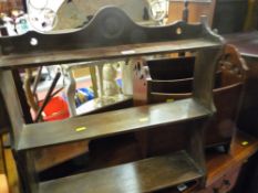 Mahogany two section magazine rack and a three shelf wall hanging bookcase