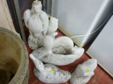 Three swan and two bird garden ornaments