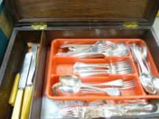 Period wooden box containing quantity of mixed cutlery
