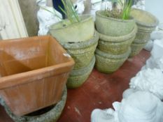 Parcel of ten circular garden stone planters and one square