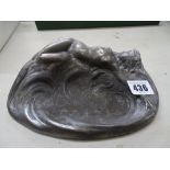 Art Nouveau style metal dish showing a reclining nude female