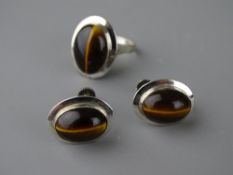 A PAIR OF NINE CARAT WHITE GOLD TIGER'S EYE EARRINGS & MATCHING DRESS RING, 12.4 grms gross, screw