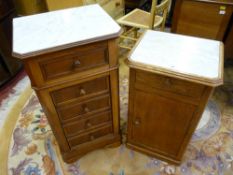 TWO FRENCH WALNUT VINTAGE POT CUPBOARDS with white marble inset tops, 82.5 cms high the tallest