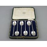 A CASED SET OF SIX PLAIN SILVER COFFEE SPOONS with spade handles, the case labelled 'Inglis &