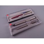 Vintage stainless steel Parker 45 Flighter fountain pen and pencil set with chrome trim, in original