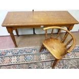 A CHILD'S SPINDLEBACK ARMCHAIR and a rectangular oak side table