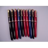 Three Vintage Parker Junior fountain pens (black, blue, red), three Parker Victory fountain pens and