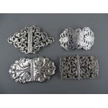 FOUR ORNATE SILVER NURSE'S BUCKLES, Birmingham hallmarks, various dates including 1909 Deacon &