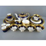 THIRTY FIVE PIECES OF AYNSLEY 'GEORGIAN COBALT' TABLEWARE to include a lidded teapot, milk jug and