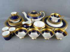 THIRTY FIVE PIECES OF AYNSLEY 'GEORGIAN COBALT' TABLEWARE to include a lidded teapot, milk jug and