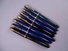 Six Vintage Parker Slimfold fountain pens (two black, four blue) and one Junior, all with 14k nibs