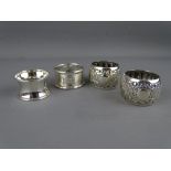 FOUR SILVER NAPKIN RINGS, 2.3 troy ozs gross