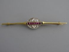 AN UNMARKED GOLD BAR BROOCH the oval centre having tiny diamonds in heart shaped and other