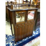 AN EDWARDIAN ROSEWOOD MUSIC CABINET with Stubleys patent label, no. 516, 106 cms high overall, 65