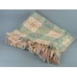 A VINTAGE WELSH WOOLLEN BLANKET, traditional pattern in green and pink tones, 215 x 200 cms