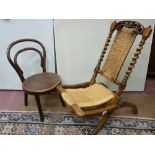 A VICTORIAN CARVED WALNUT FOLDING CHAIR and a child's bentwood chair, 75 and 61 cms high