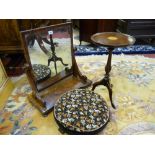 A REGENCY MAHOGANY DRESSING MIRROR, an embroidered footstool and a reproduction mahogany wine table,