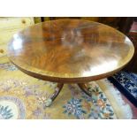A MAHOGANY TILT TOP BREAKFAST TABLE with segmented veneer top, 120 cms diameter, 73.5 cms high
