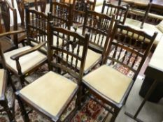 A SET OF EIGHT (SIX PLUS TWO) OAK SPINDLEBACK DINING CHAIRS with upholstered drop-in seats