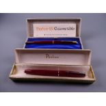 Vintage red Parker 45 Deluxe fountain pen (with chalk marks), in original box with instructions/