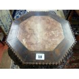 A CHINESE CARVED HARDWOOD MARBLE TOPPED STAND, 90 cms high