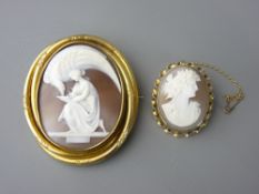 A LARGE VICTORIAN PINCHBECK CARVED CAMEO BROOCH and one other, 6.25 and 3 cms long respectively