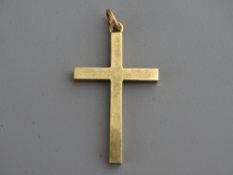 A PLAIN NINE CARAT GOLD CROSS PENDANT, 4.8 grms