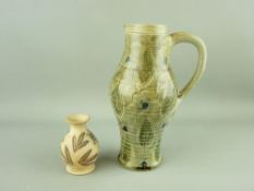 A MARTIN BROTHERS STONEWARE JUG and a small bulbous vase, 'R W Martin, Southall' impressed and '
