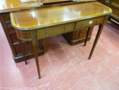 A REPRODUCTION CROSSBANDED MAHOGANY TWO DRAWER HALL TABLE with small railback, 76 cms high