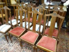 A SET OF TWELVE MAHOGANY SPLATBACK DINING CHAIRS with drop-in seats