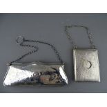 AN 18 cms LONG SILVER EVENING PURSE, Birmingham 1912 and a white metal combination necessaire with